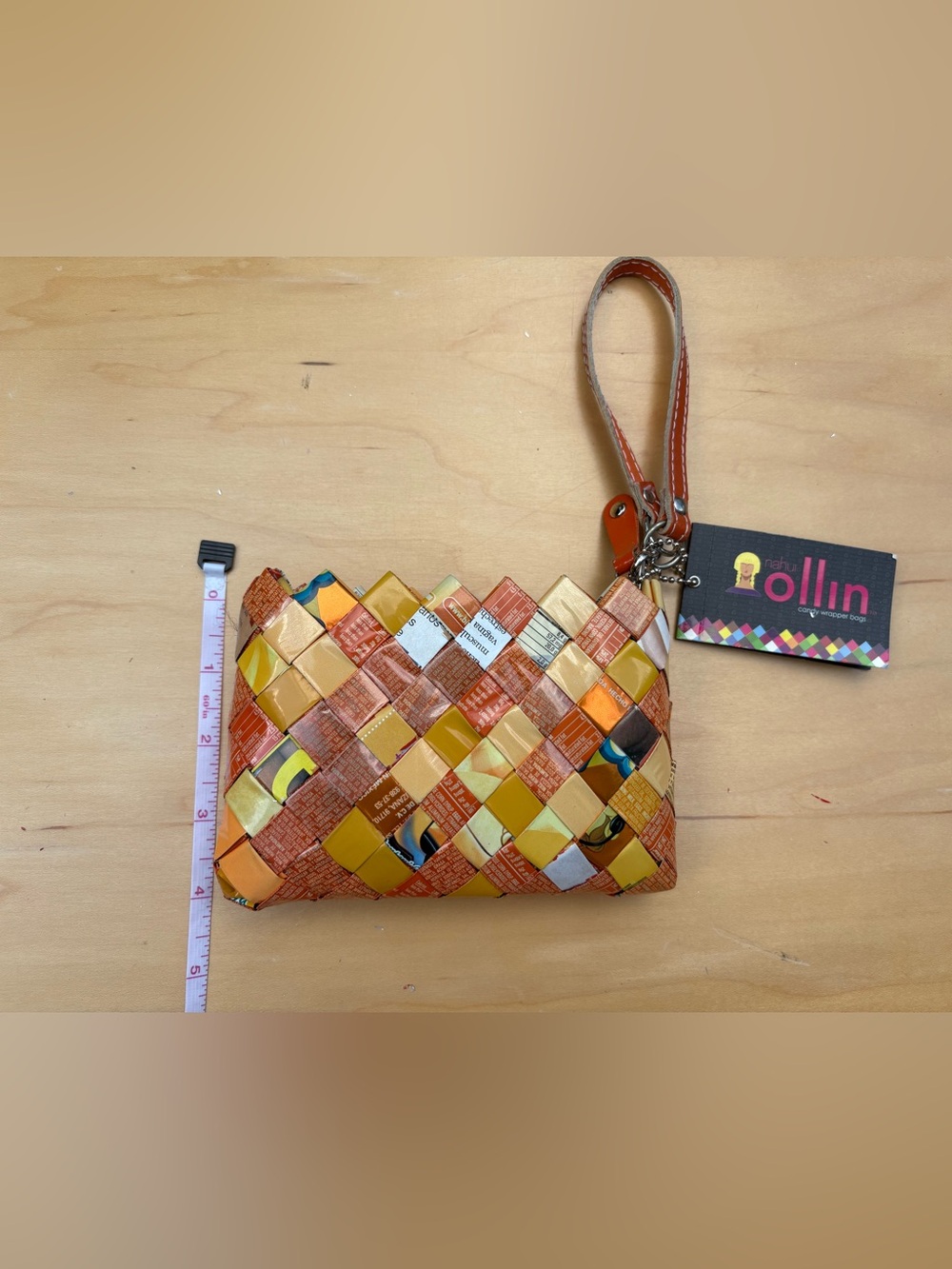 Candy wrapper by nahui ollin Orange Yellow Wristlet Pouch with leather straps